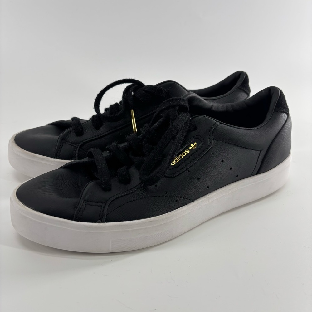 Adidas Sleek black low top leather sneakers 7.5 gold logo Size